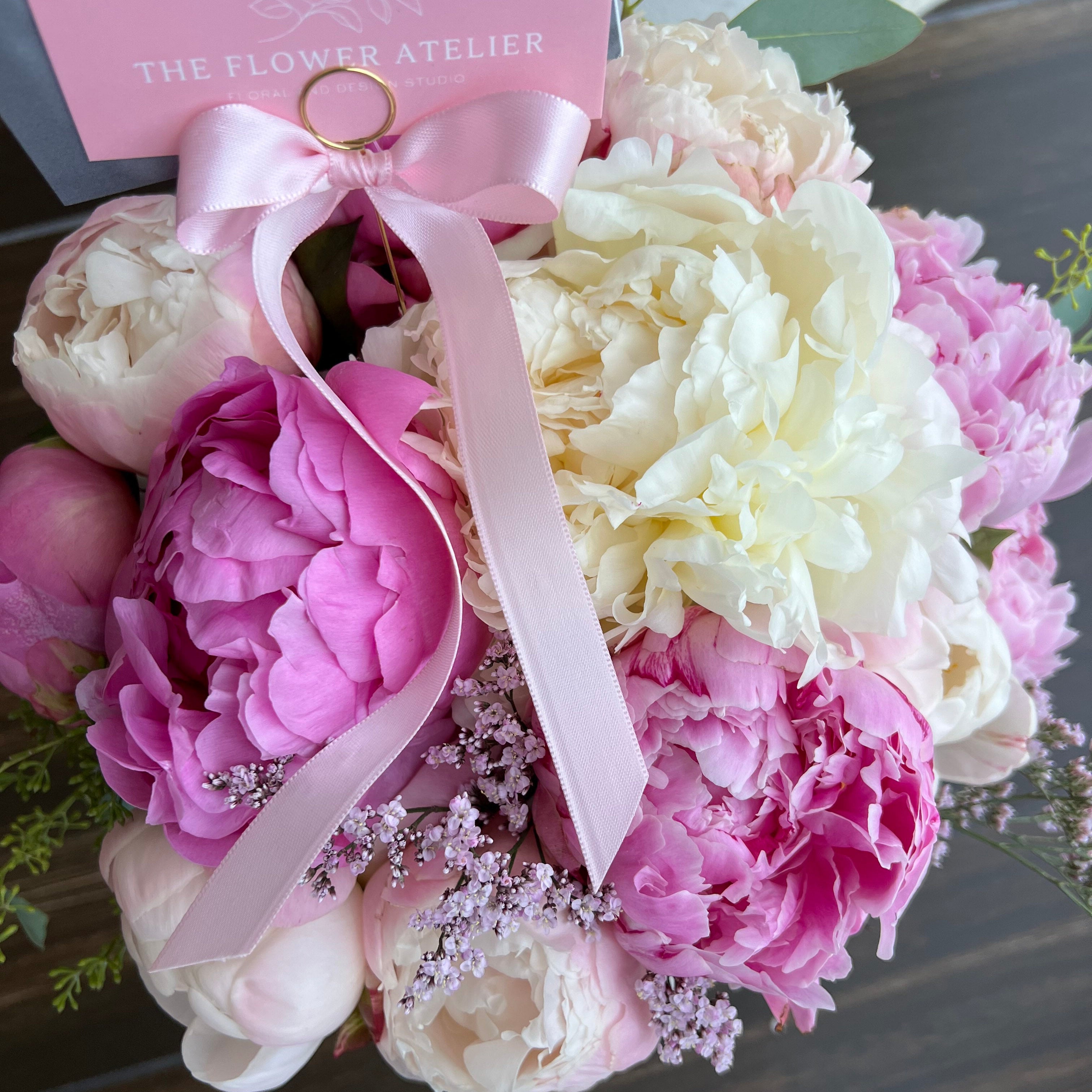 Pink peonies, cream peonies, blush peonies in plano, legacy west by the flower atelier, alexandra beswerchij